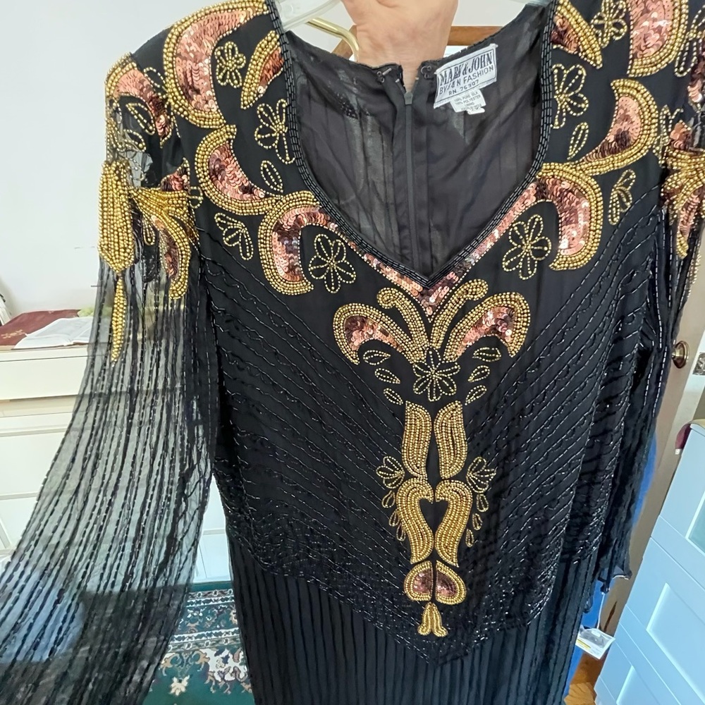 Beautiful black and gold high-quality evening gown